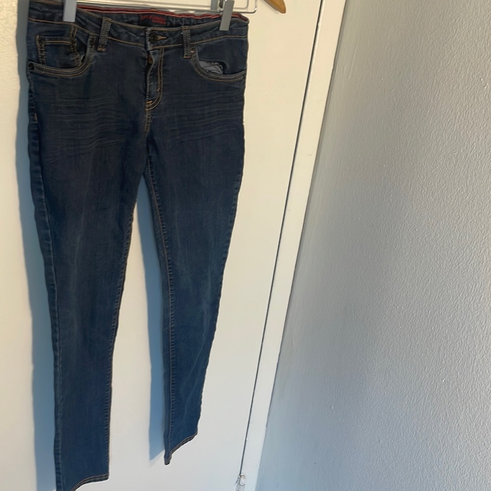 This is a dark blue Levi’s tight jeans that’s size 14